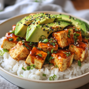 Tofu and Avocado on Top of White Rice with Spicy Sauce Drizzled Recipe